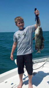 Coin Seal of Land O' Lakes shows off his fish on a recent adventure around Tampa Bay!